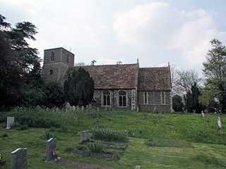 Tadlow crouches atop its weedy churchyard